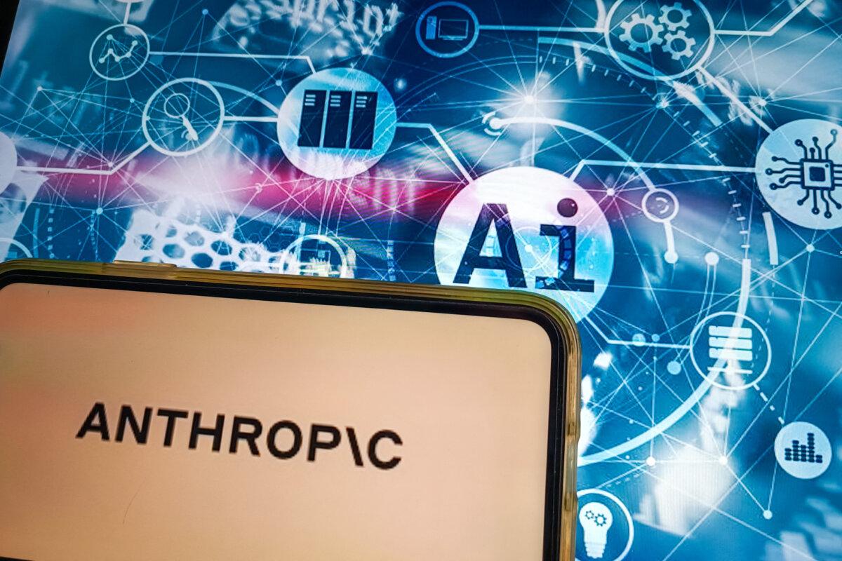 An illustration showing Anthropic's logo on a mobile phone. (Riccardo Milani/Hans Lucas via AFP via Getty Images)