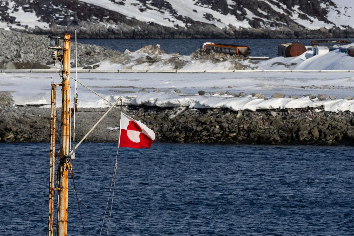The Greenlandic flag blows outside of Nuuk, Greenland, on May 4, 2025. (John Fredricks/The Epoch Times)