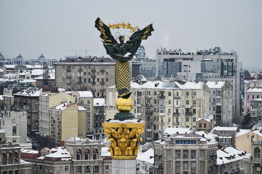 This photograph shows the Independence Monument towering over the Independence Square in Kyiv on February 6, 2026, amid the Russian invasion of Ukraine. (Photo by Genya SAVILOV / AFP via Getty Images)