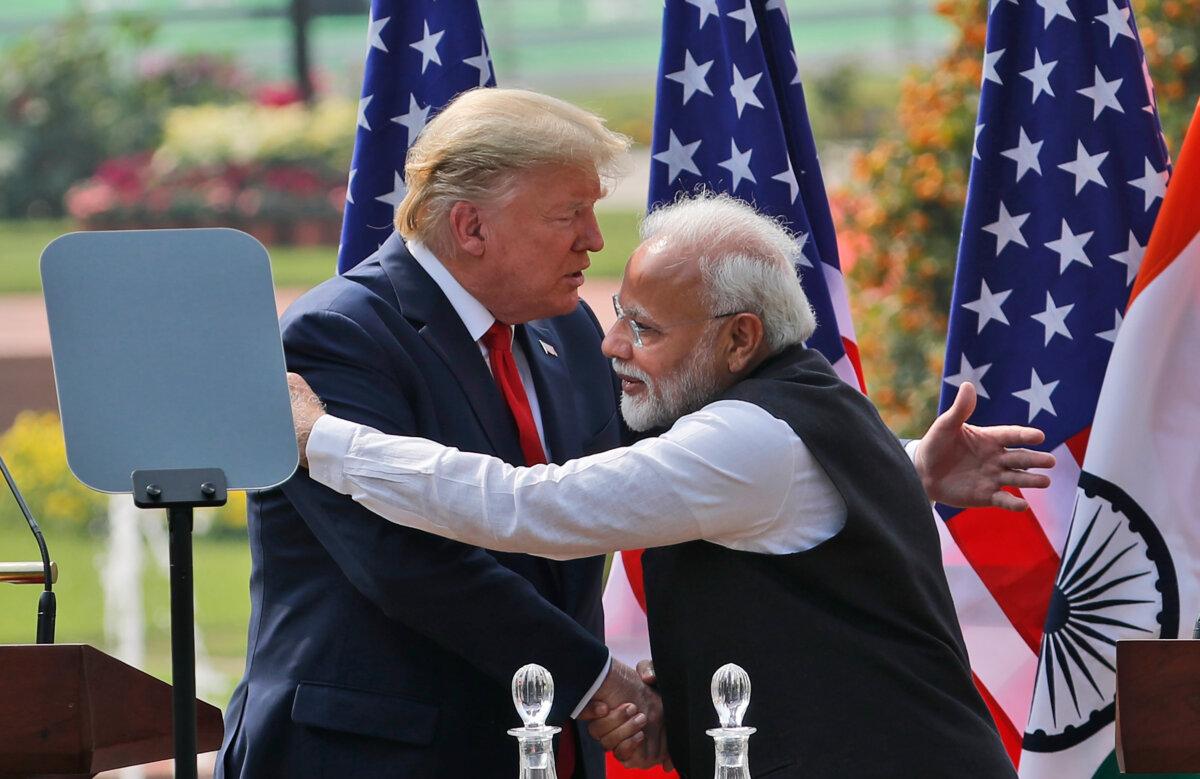 U.S. President Donald Trump and Indian Prime Minister Narendra Modi embrace after giving a joint statement in New Delhi on Feb. 25, 2020. (Manish Swarup/AP Photo)