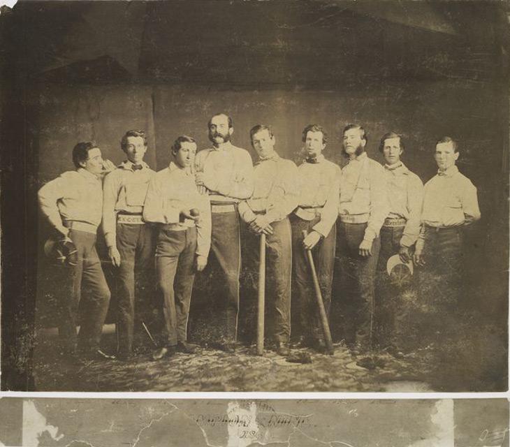 An 1860 team photo of the Excelsiors show James Creighton (3rd from L) and his catcher Joseph Leggett (3rd from R). (Public Domain)
