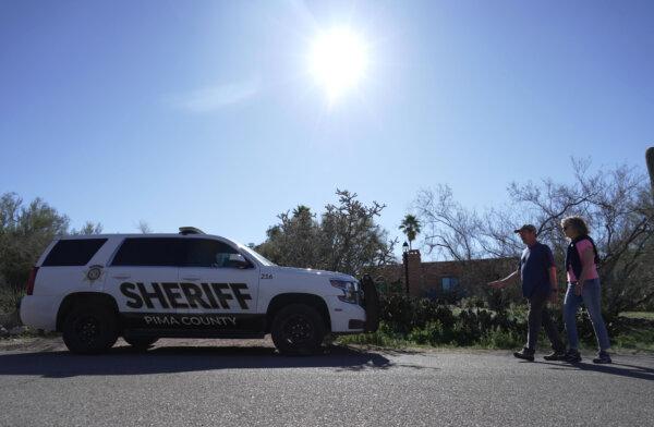 Savannah Guthrie’s Family Requests Police Presence at Missing Mother’s Home, Officials Say | USNN World News A Pima County sheriff's vehicle in front of Nancy Guthrie’s home near Tucson, Ariz., on Feb. 8, 2026. (Ty ONeil/AP Photo)