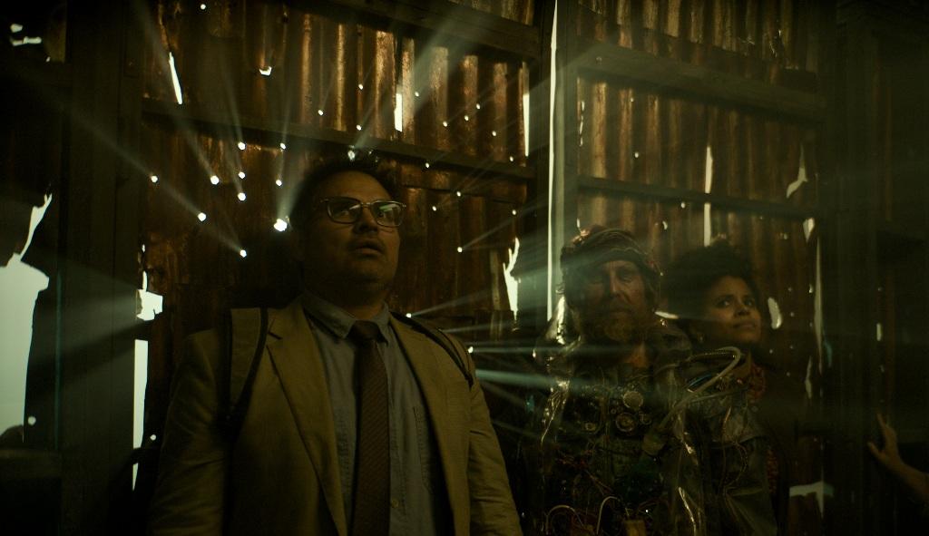 (L–R) Mark (Michael Peña), Future Man (Sam Rockwell), and Janet (Zazie Beetz), in “Good Luck, Have Fun, Don’t Die.” (Briarcliff Entertainment)