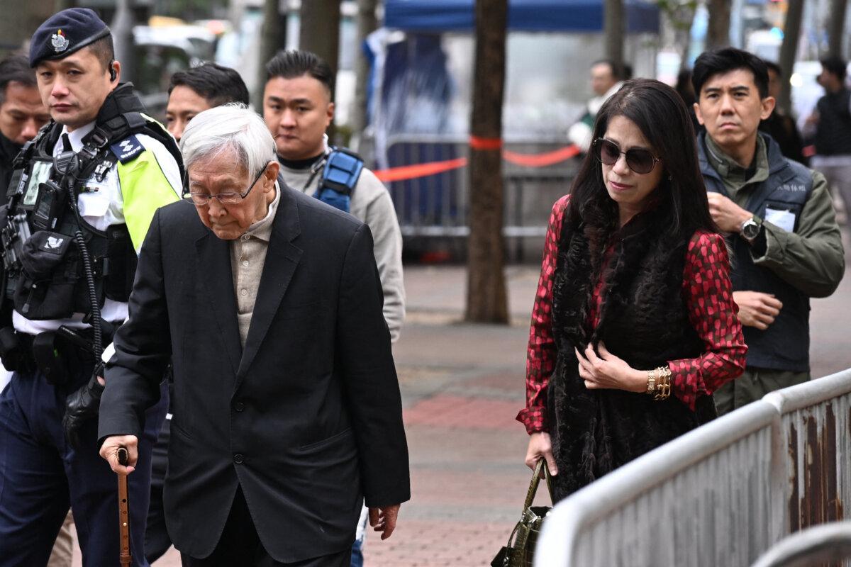 Teresa Lai (R), wife of former media tycoon Jimmy Lai, and Cardinal Joseph Zen, retired Catholic bishop of Hong Kong (L), arrive at the West Kowloon Magistrates' Court for Jimmy Lai's sentencing, in Hong Kong on Feb. 9, 2026. (Peter Parks/AFP via Getty Images)