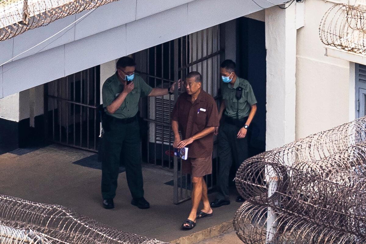 Jimmy Lai walks through Stanley Prison in Hong Kong on July 28, 2023. (Louise Delmotte/AP Photo)