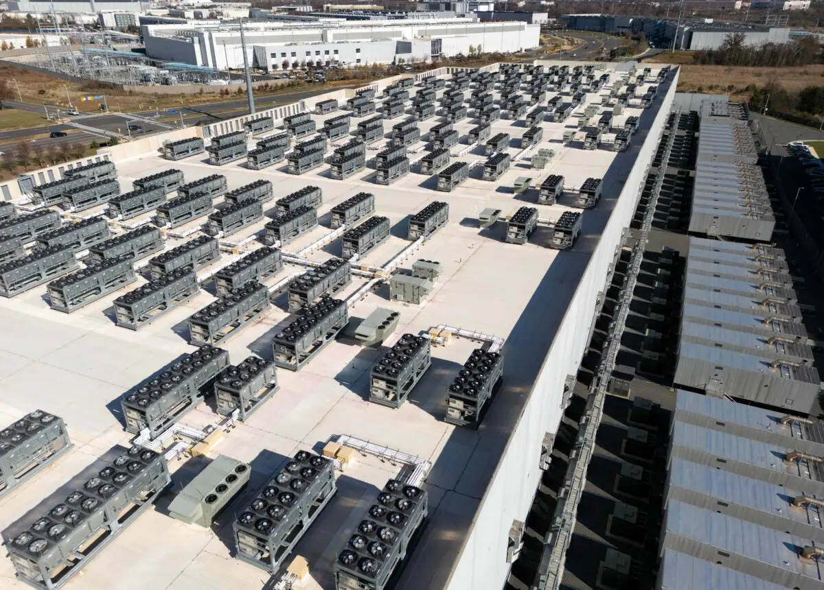 Cooling vent fans on the roof next to generators on the lower level of a Digital Realty data center in Ashburn, Va., on Nov. 12, 2025. (Andrew Caballero-Reynolds/AFP via Getty Images)