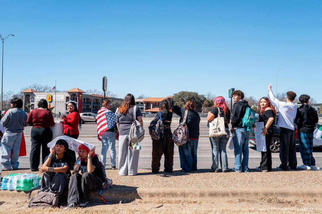 High school students stage a walkout in protest against ICE in Austin, Texas, on Feb. 6, 2026. Students from across several high schools in Central Austin participated in a walkout. (Brandon Bell/Getty Images)