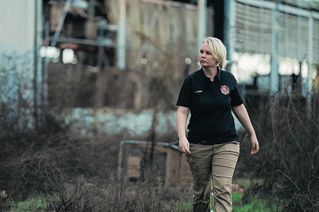 City of Reedley Code Enforcement Officer Jesalyn Harper stands outside the illegal biolab on Feb. 7, 2024. (Paulio Shakespeare for The Epoch Times)