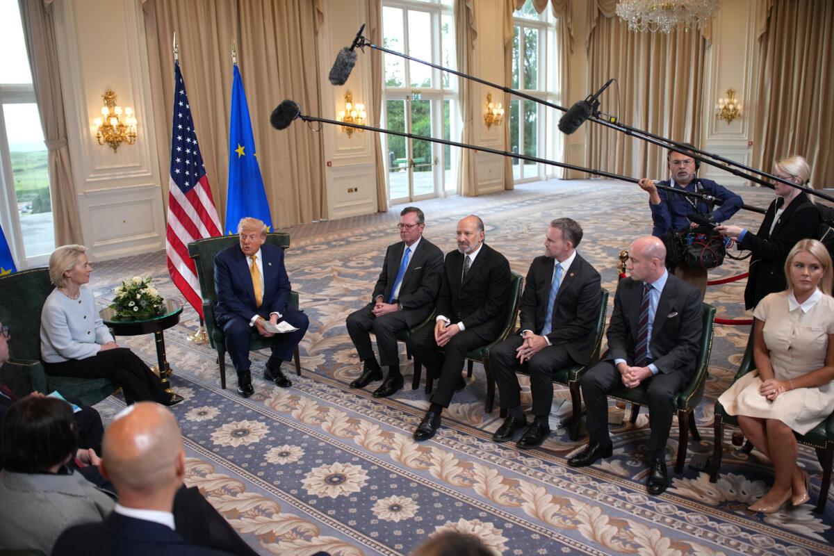 U.S. President Donald Trump announces a trade deal with the European Union after a meeting with European Commission President Ursula von der Leyen (L) as U.S. Ambassador to the UK Warren Stephens (3rd L), White House Deputy Chief of Staff Stephen Miller (2nd R), and White House press secretary Karoline Leavitt (R) look on at Trump Turnberry golf club in Scotland on July 27, 2025. (Andrew Harnik/Getty Images)