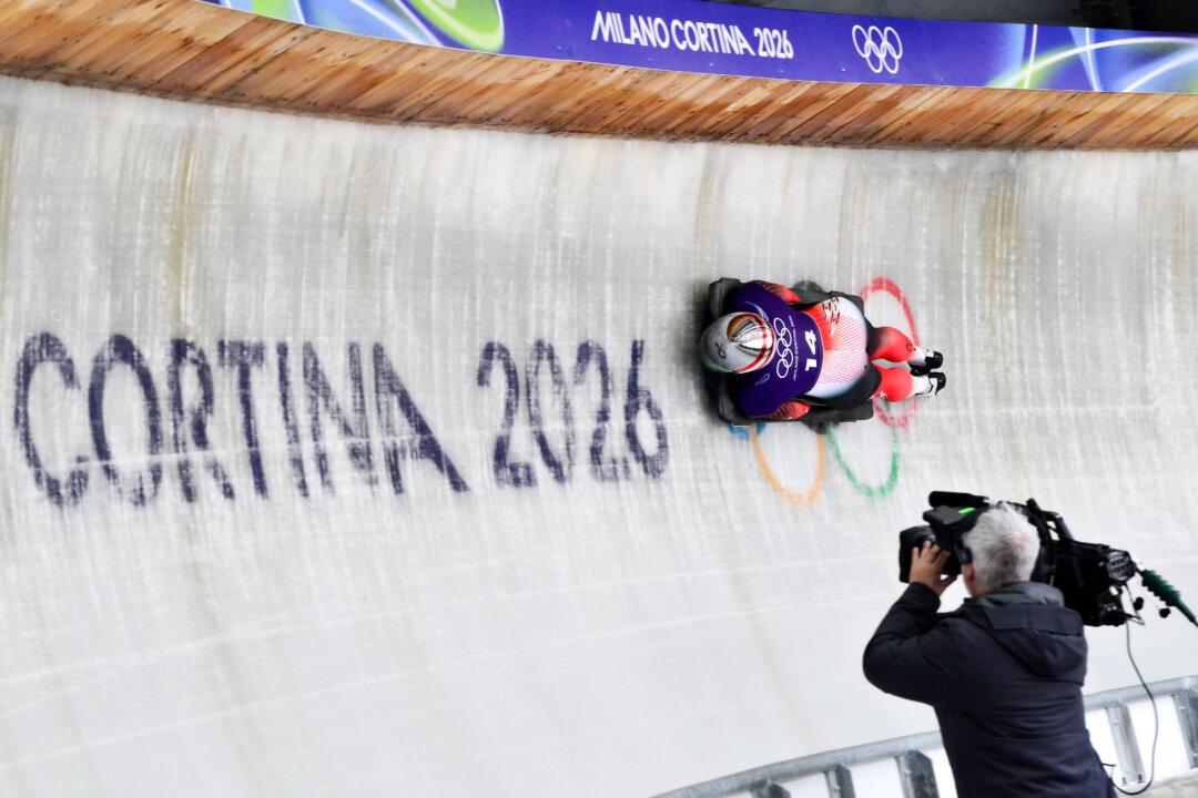 Austria's Janine Flock takes part in the skeleton women's training session at Cortina Sliding Centre during the Milano Cortina 2026 Winter Olympic Games in Cortina d'Ampezzo on February 11, 2026. (Photo by Stefano RELLANDINI / AFP via Getty Images)