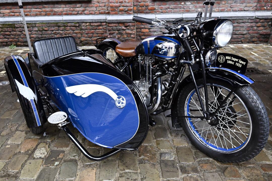 A vintage motorcycle pictured at the FN Browning factory in Herstal, during a royal visit on Wednesday 11 February 2026. The King will see several key production lines, including those dedicated to mechanisation, electronics and motherboards for motor vehicles (CaMo), and remote-controlled weapon stations. BELGA PHOTO ERIC LALMAND (Photo by ERIC LALMAND / BELGA MAG / Belga / AFP via Getty Images)