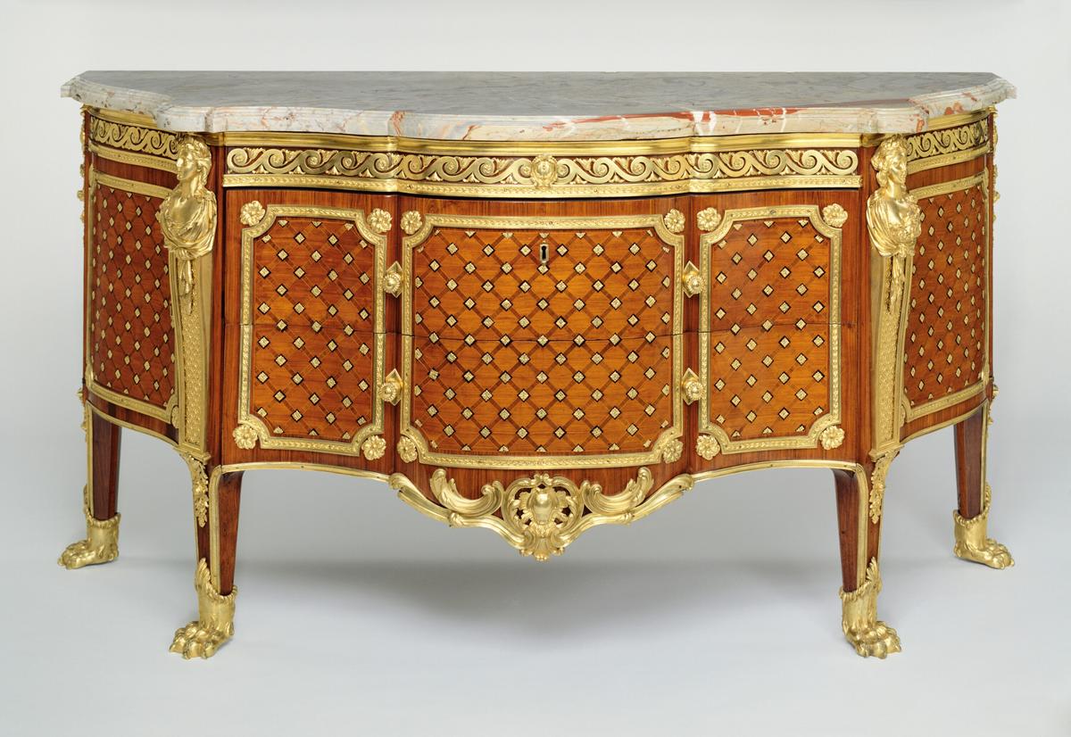 Commode, 1769, by Gilles Joubert. Oak veneered with kingwood, tulipwood, holly, bloodwood, and ebony; gilt-bronze mounts; sarrancolin marble top; 36 13/16 inches by 71 1/4 inches by 27 inches. J. Paul Getty Museum, Los Angeles. (Public Domain)