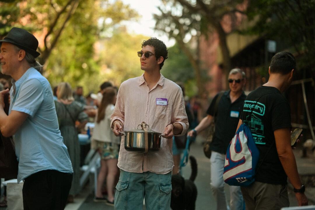 The Longest Table’s 2025 event in the Chelsea neighborhood of New York City on Oct. 5, 2025. Since launching in 2022, the gathering has grown to include hundreds, and now thousands, of neighbors. Organizer Maryam Banikarim and her nonprofit, New York City Next, provide tables and chairs while residents bring food for a large-scale potluck. (Courtesy of Mark Walker/The Longest Table)