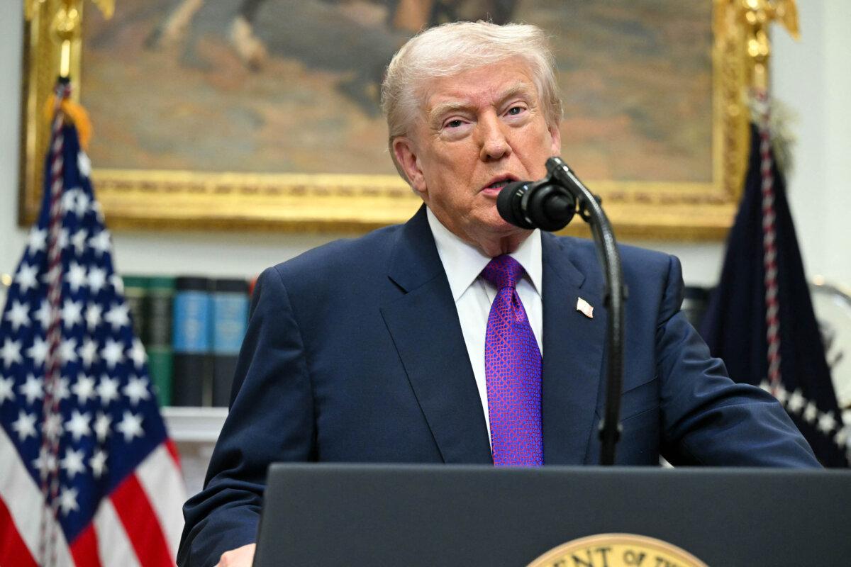 US President Donald Trump makes an announcement in the Roosevelt Room of the White House in Washington, DC on February 12, 2026. (SAUL LOEB / AFP via Getty Images)
