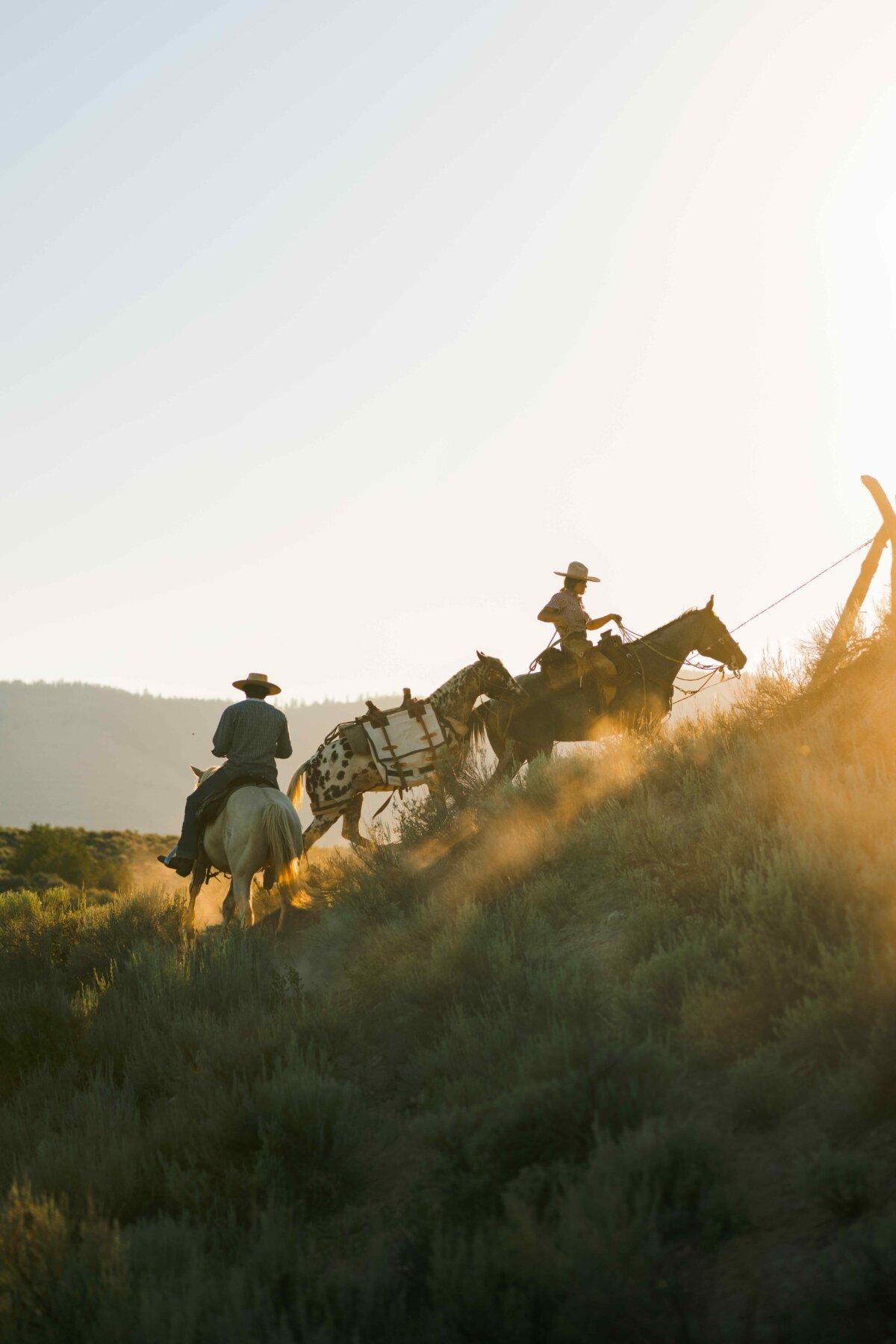 Sperandeo rides on her mare, Raven, while on the ranch with a visiting friend. (Wes Walker)