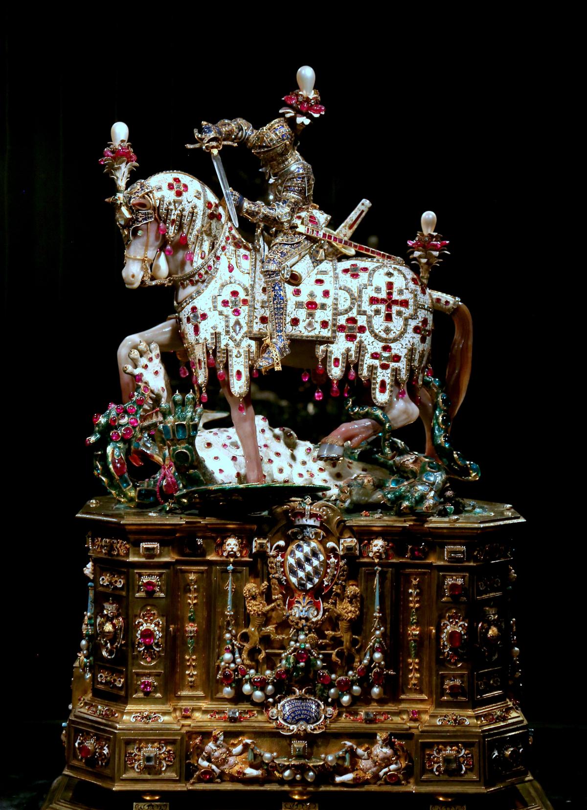 Statuette of Saint George slaying the dragon, circa 1590s, attributed to Friedrich Sustris and Hans Scheich. Gold, enamel, silver, diamonds, rubies, emeralds, rock crystal, and pearls; 19 11/16 inches. Treasury of the Munich Residenz, Germany. (<a title="User:Thaler Tamas" href="https://commons.wikimedia.org/wiki/User:Thaler_Tamas">Thaler Tamas</a>/ <a title="Category:CC-BY-SA-4.0" href="https://commons.wikimedia.org/wiki/Category:CC-BY-SA-4.0">CC-BY-SA-4.0</a>)