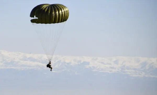 Day in Photos: Parachute Descending Drills, First Meeting of the Board of Peace, and Volcanic Eruption in the Philippines