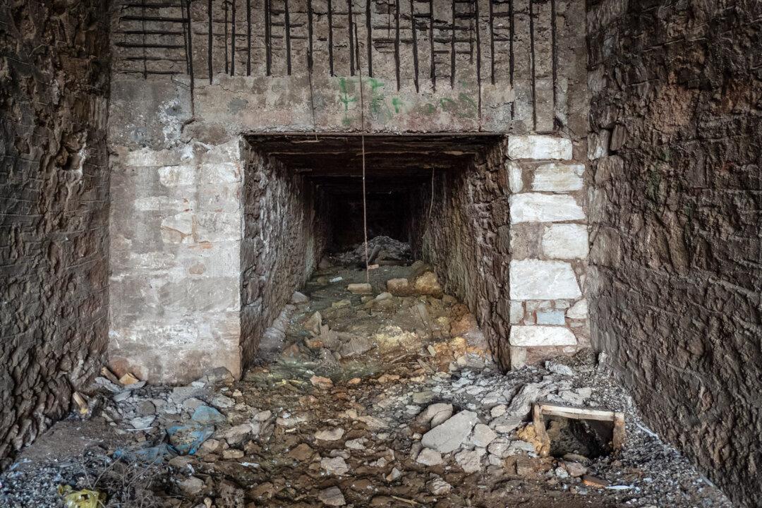 (Top) An old mining facility sits near the port of Lavrio, Greece, on Nov. 12, 2025. Greece’s largely unexploited antimony deposits have drawn interest as Western countries seek to reduce reliance on China. (Bottom L–R) Mine shafts at a former mining facility near the port of Lavrio, Greece, on Nov. 12, 2025. (John Fredricks/The Epoch Times)