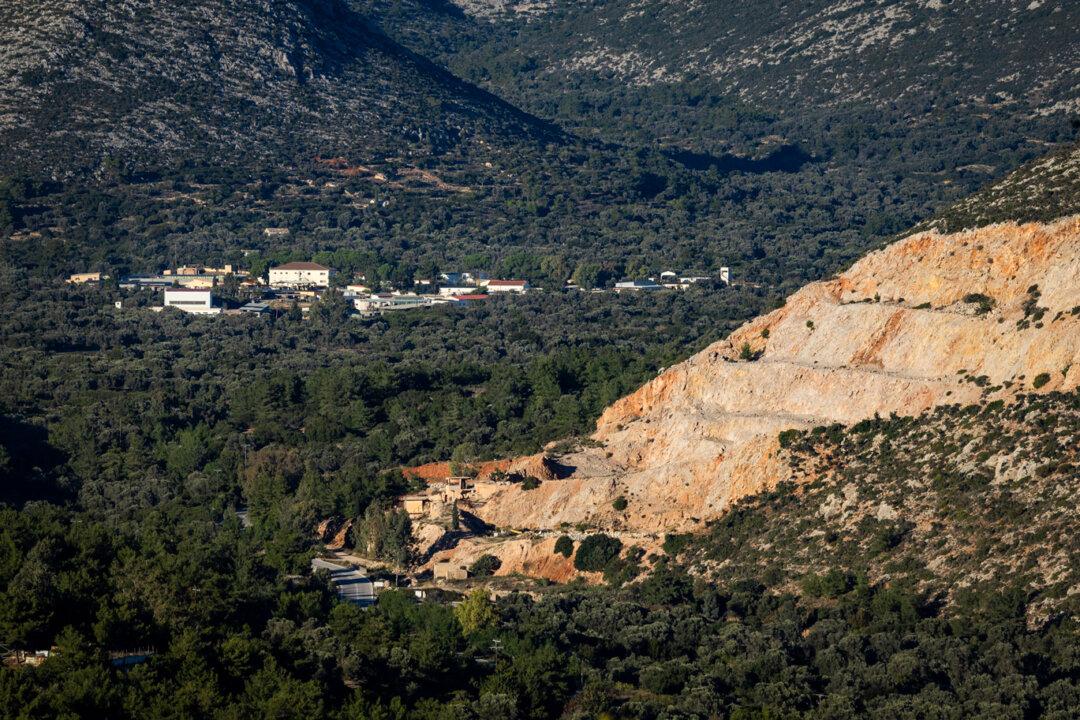 A quarry mine sits in view of a highway outside of Chios, Greece, on Nov. 12, 2025. (John Fredricks/The Epoch Times)