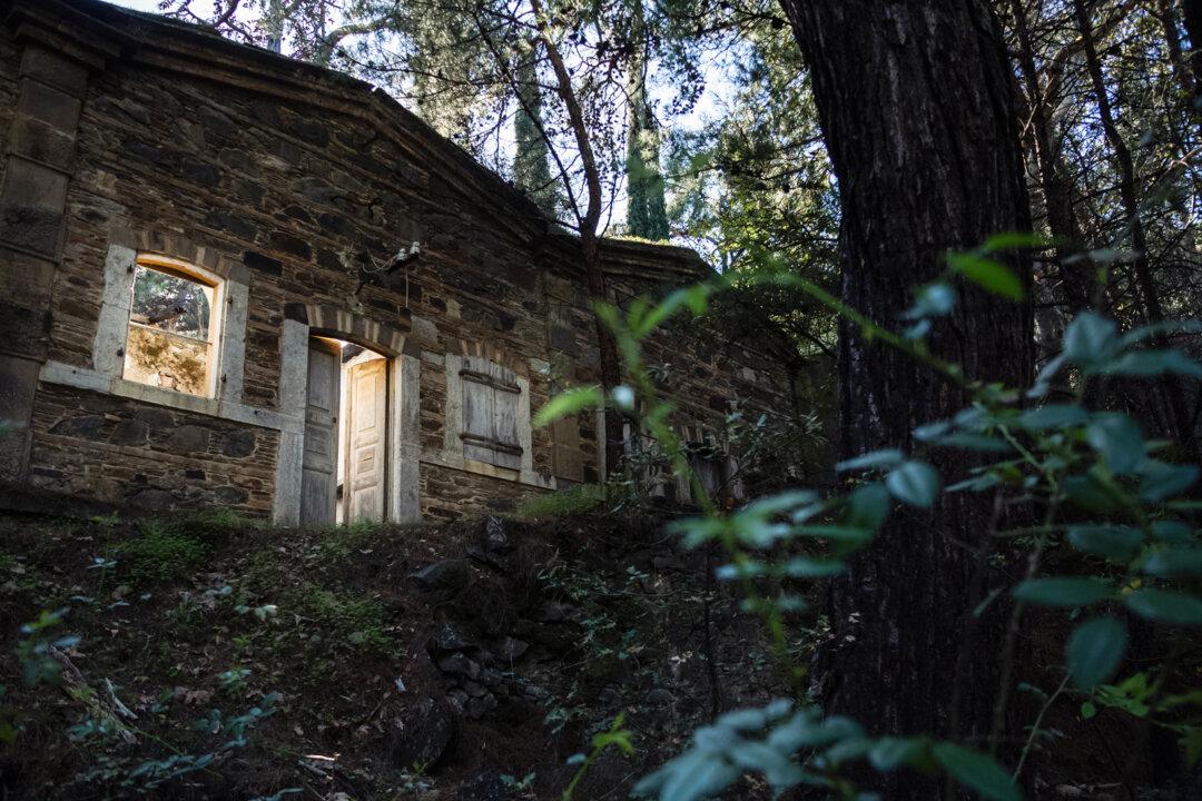 Buildings that once housed mining personnel now sit abandoned near the village of Keramos, Greece, on Nov. 14, 2025. The mines here operated in the late 1800s and early 1900s, with another brief revival in the mid-20th century funded by the Marshall Plan. (John Fredricks/The Epoch Times)