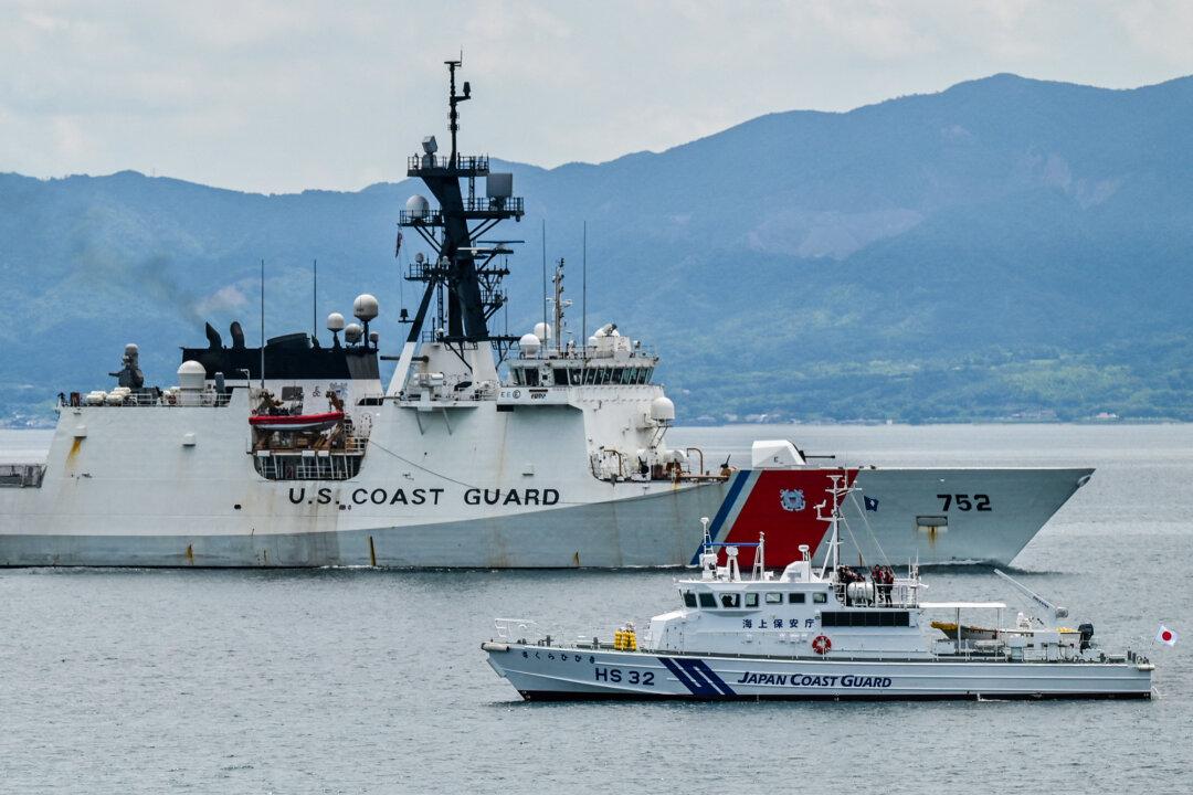 A U.S. Coast Guard ship (L) sails past a Japan Coast Guard support ship during exercises with Philippine and Japan Coast Guard vessels in waters near Kagoshima, Japan, on June 20, 2025. The joint exercises are seen as a show of unity against Chinese activity in disputed regional waters. (Richard A. Brooks/AFP via Getty Images)