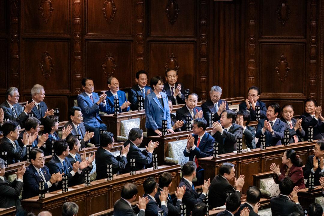 Liberal Democratic Party President Sanae Takaichi is applauded after lawmakers in Japan’s lower house elected her prime minister in Tokyo on Oct. 21, 2025. Takaichi was reelected by parliament on Feb. 18 following a landslide victory in the lower house in the Feb. 8 snap election. (Tomohiro Ohsumi/Getty Images)