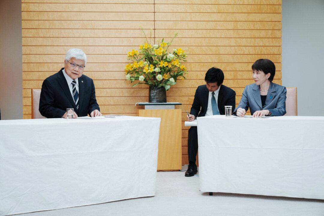 TSMC Chairman Che-Chia Wei (L) speaks during a meeting with Japan’s Prime Minister Sanae Takaichi (R) at the Prime Minister’s Office in Tokyo on Feb. 5, 2026. (Kazuhiro Nogi/POOL/AFP via Getty Images)
