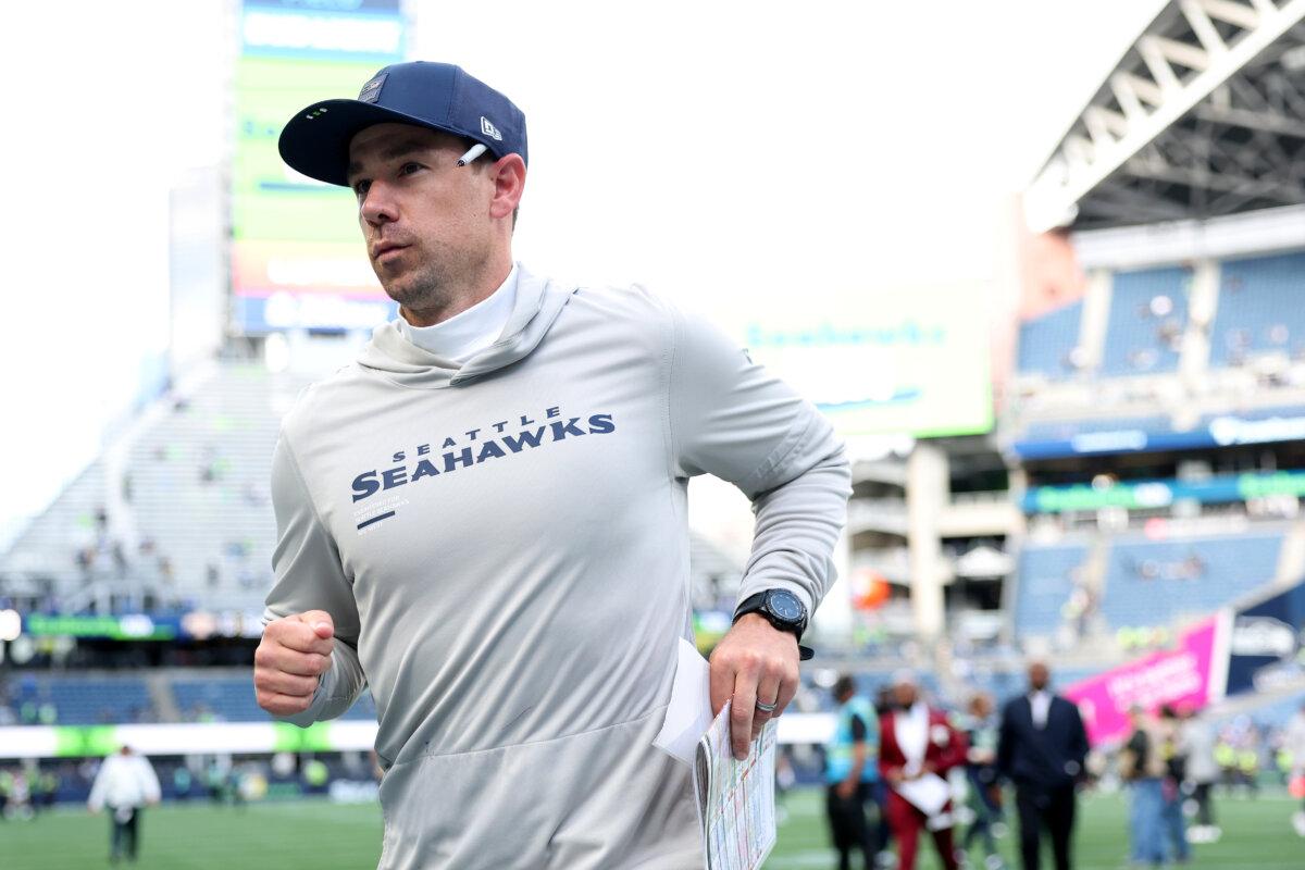 Offensive coordinator Klint Kubiak of the Seattle Seahawks jogs off the field after beating the New Orleans Saints at Lumen Field in Seattle on September 21, 2025. (Steph Chambers/Getty Images)