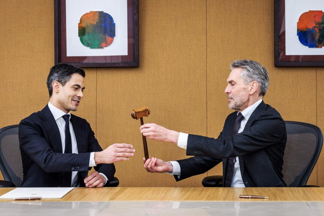 The Netherlands former Prime Minister Dick Schoof (R) and his successor Rob Jetten (L) attend the traditional handover ceremony in the Treveszaal room in The Hague on February 23, 2026. (Photo by Remko de Waal / ANP / AFP via Getty Images) / Netherlands OUT
