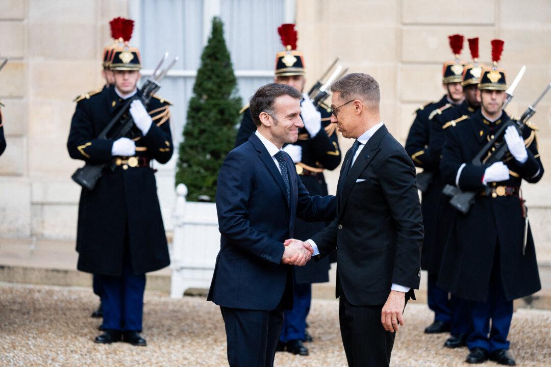 France s President Emmanuel Macron welcomes Finland s President Alexander Stubb before a meeting at The Elysee Presidential Palace in Paris on February 23, 2026. (Photo by Magali Cohen / Hans Lucas / AFP via Getty Images)