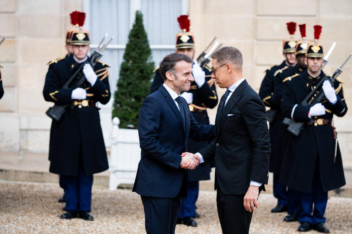 French President Emmanuel Macron welcomes Finnish President Alexander Stubb before a meeting at the Élysée Palace in Paris on Feb. 23, 2026. (Magali Cohen/Hans Lucas/AFP via Getty Images)