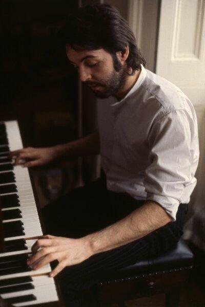 Paul McCartney at the piano, in the documentary, "Paul McCartney: Man on the Run." (Amazon/MGM Studios)