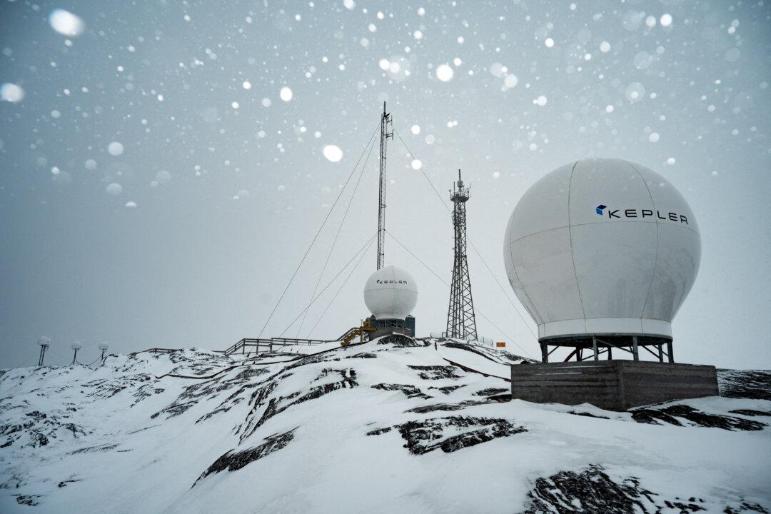 This photograph shows a radio and satellite telecommunications station during a snowstorm in Nuuk, Greenland, on February 24, 2026. In Greenland, connectivity relies on a fragile and expensive network. Bad weather often causes outages, even though communications are vital for the isolated villages of this vast Arctic country with limited infrastructure. (Photo by Florent VERGNES / AFP via Getty Images)