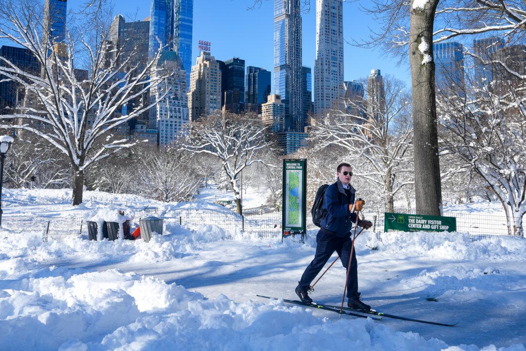NEW YORK, NEW YORK - FEBRUARY 24: A man on cross-country skis travels through Central Park after a historic blizzard hit parts of the East Coast, on February 24, 2026 in New York City. The snowstorm delivered up to 30 inches of snow to parts of New York City leaving tens of thousands of residents without power. (Photo by Ryan Murphy/Getty Images)