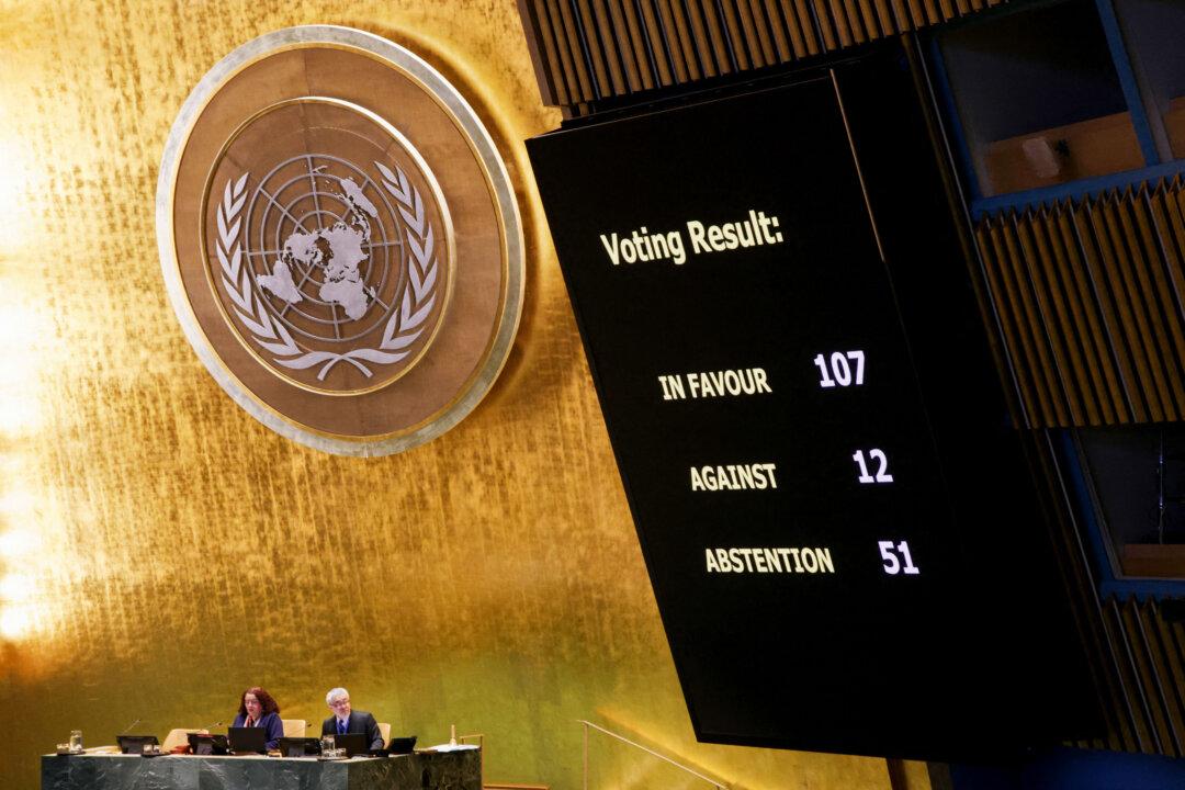 A screen displays the voting results approving a draft resolution in support of lasting peace in Ukraine during the United Nations General Assembly meeting on Ukraine at UN Headquarters in New York, on February 24, 2026. February 24, 2026 marks the fourth anniversary of Russia's war against Ukraine. (Photo by Leonardo Munoz / AFP via Getty Images)