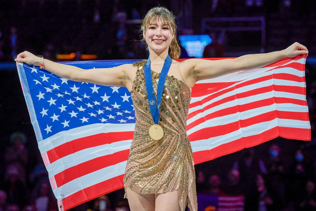 U.S. gold medalist Alysa Liu celebrates on the podium during the women’s medal ceremony at the 2025 ISU World Figure Skating Championships at the TD Garden in Boston on March 28, 2025. (Geoff Robins/AFP via Getty Images)