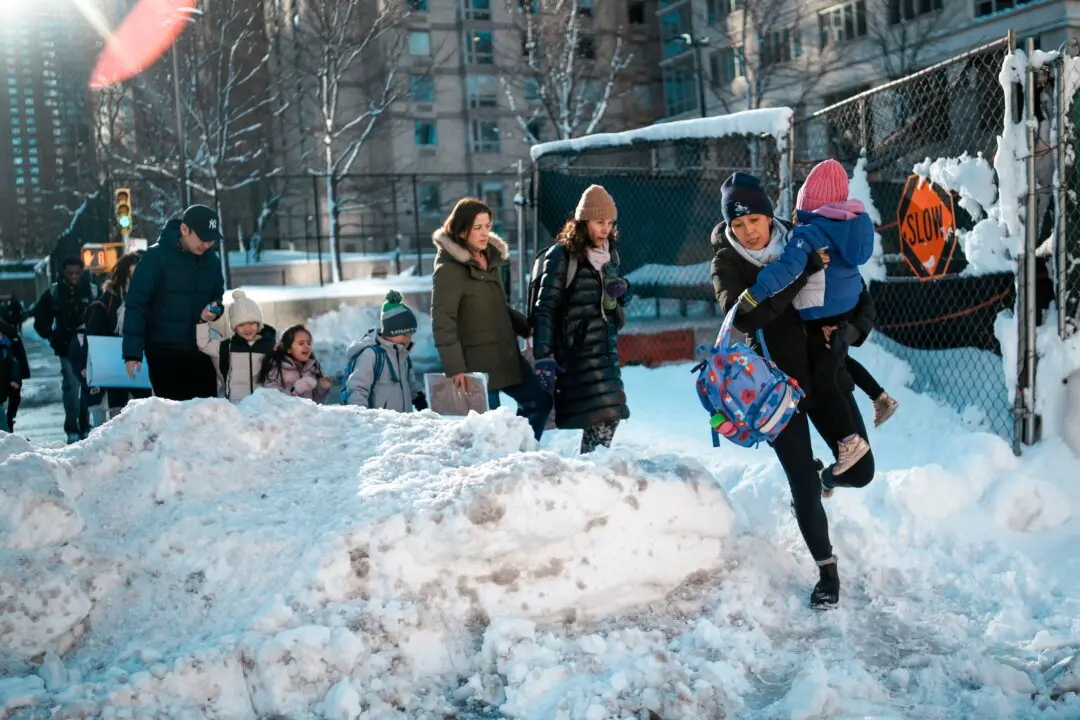 Northeast US Digs Out From Brutal Snowstorm That Disrupted Flights and Canceled School