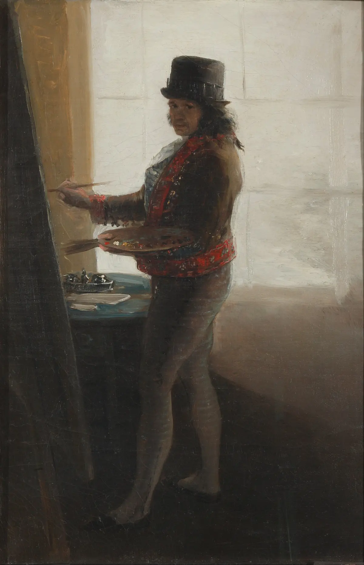 The artist's self-portrait in his studio, 1790–1795, by Goya. Oil on canvas; 16 1/2 inches by 11 inches.<br/>Royal Academy of Fine Arts of San Fernando, Madrid, Spain. (Public Domain)