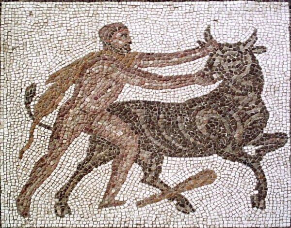Hercules capturing the Cretan Bull. Detail of the 'Twelve Labors' Roman mosaic from Lliria, now Valencia, Spain, at the National Archaeological Museum of Spain, Madrid. (<a href="https://commons.wikimedia.org/wiki/File:Mosaico_Trabajos_H%C3%A9rcules_(M.A.N._Madrid)_07.jpg">Luis García, CC BY-SA 3.0</a>)