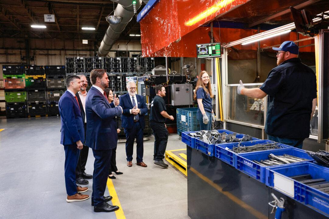 US Vice President JD Vance (3rd L) tours Hatch Stamping in Howell, Mich., on Sept. 17, 2025. US manufacturing activity expanded in January for the first time in 12 months. (Jeff Kowalsky/AFP via Getty Images)