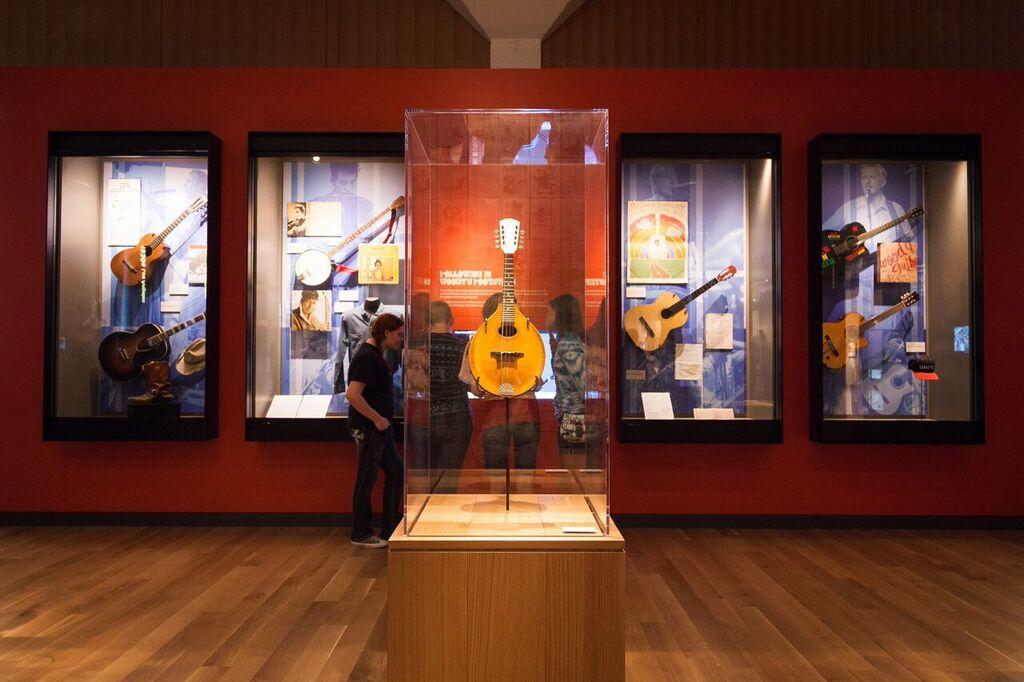 Woody Guthrie, commemorated by the Woody Guthrie Center, wrote more than 1,000 songs over his career. Many chronicled migration, labor struggles, and everyday American life during the Depression era. (Courtesy of the Woody Guthrie Center)