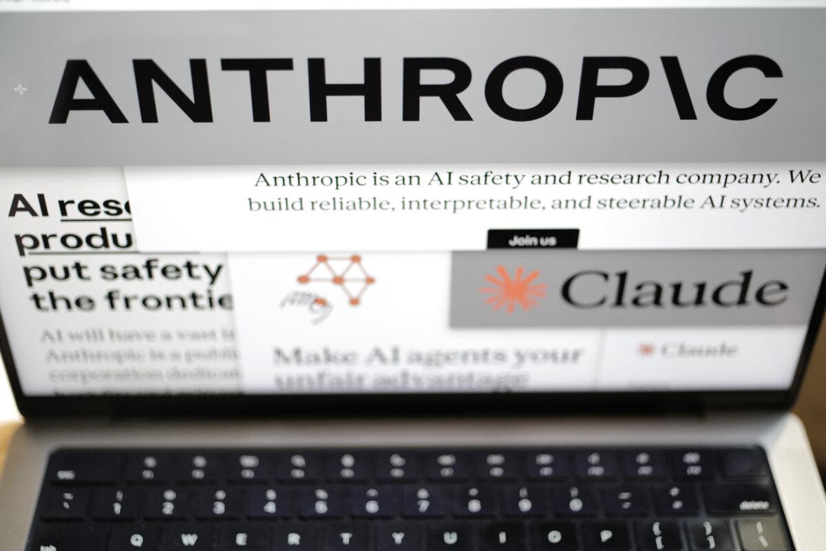 Pentagon Forges Partnership With Leading AI Companies | USNN World News Pages from the Anthropic website and the company's logos are displayed on a computer screen in New York on Feb. 26, 2026. (AP Photo/Patrick Sison)