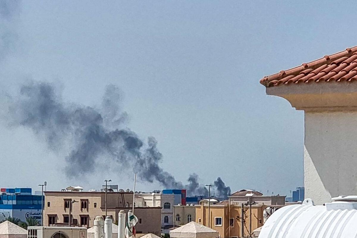 A smoke plume rises over Abu Dhabi from the site of an Iranian missile strike, on Feb. 28, 2026. (AFP via Getty Images)