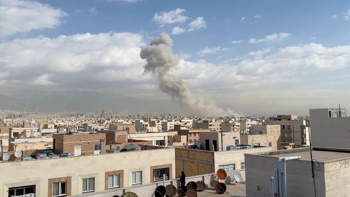Smoke rises following an explosion, after Israel's Defence Minister Israel Katz said Israel had launched a pre-emptive attack against Iran, in Tehran, Iran, on Feb. 28, 2026. (West Asia News Agency/Handout via Reuters)
