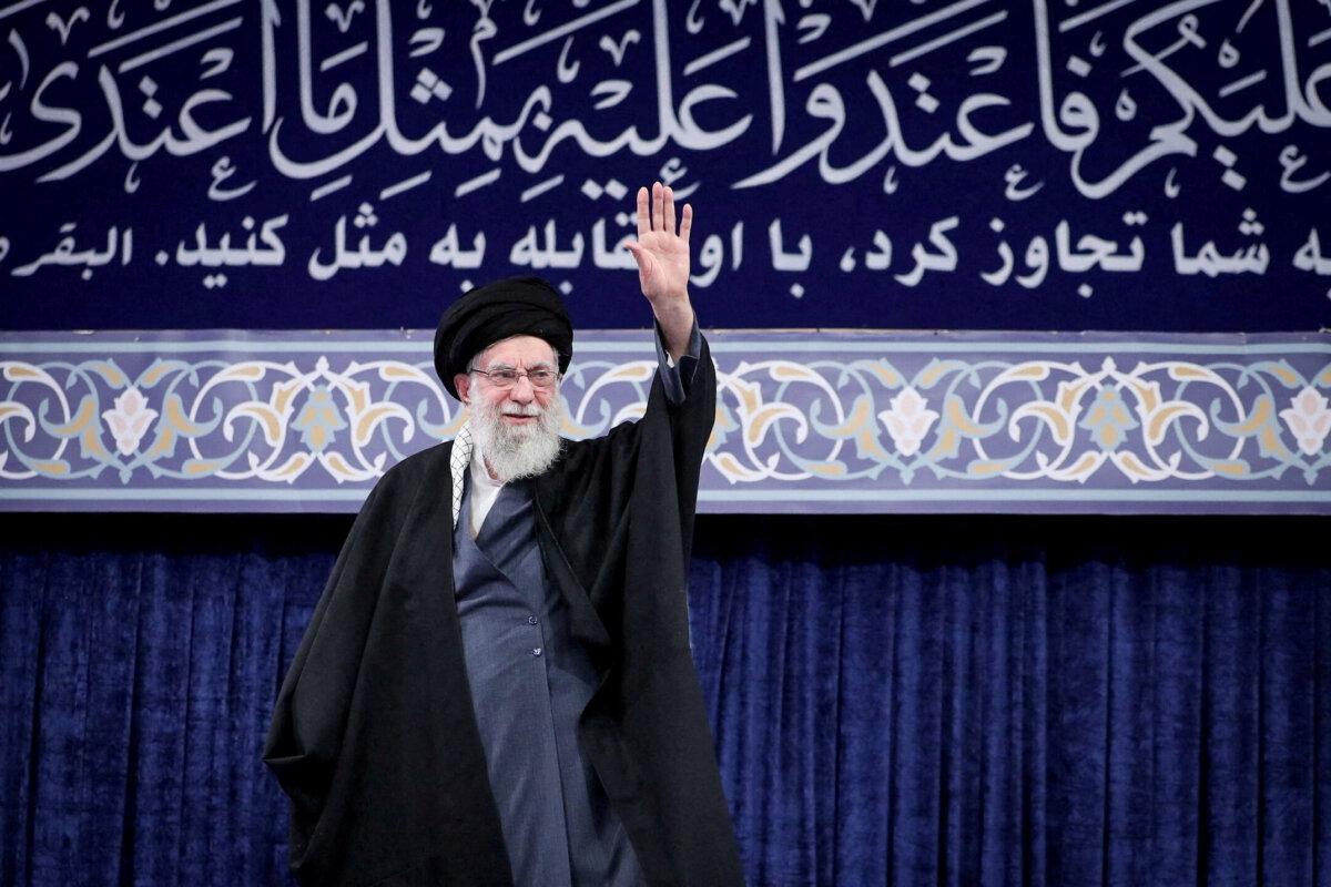 Iran's Supreme Leader Ayatollah Ali Khamenei waves during a meeting in Tehran, Iran, on Feb. 17, 2026. (Office of the Iranian Supreme Leader/West Asia News Agency/Handout via Reuters)