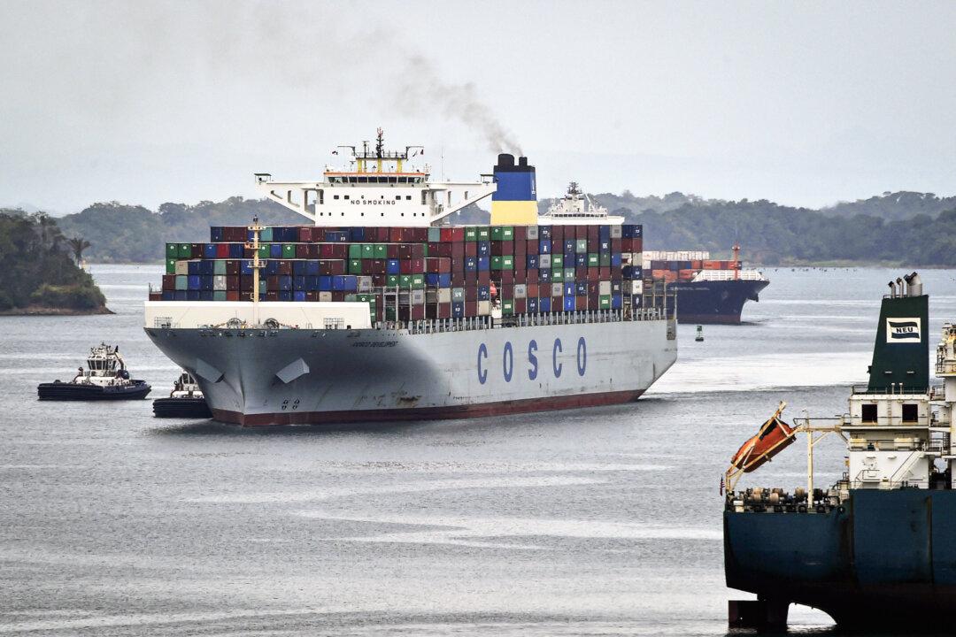 Container ship Cosco Development, registered and sailing under the flag of Hong Kong, with capacity for more than 13,000 containers, is seen at the Agua Clara locks in Colon, 56 miles from Panama City, Panama, on May 2, 2017. (Rodrigo Arangua/AFP via Getty Images)