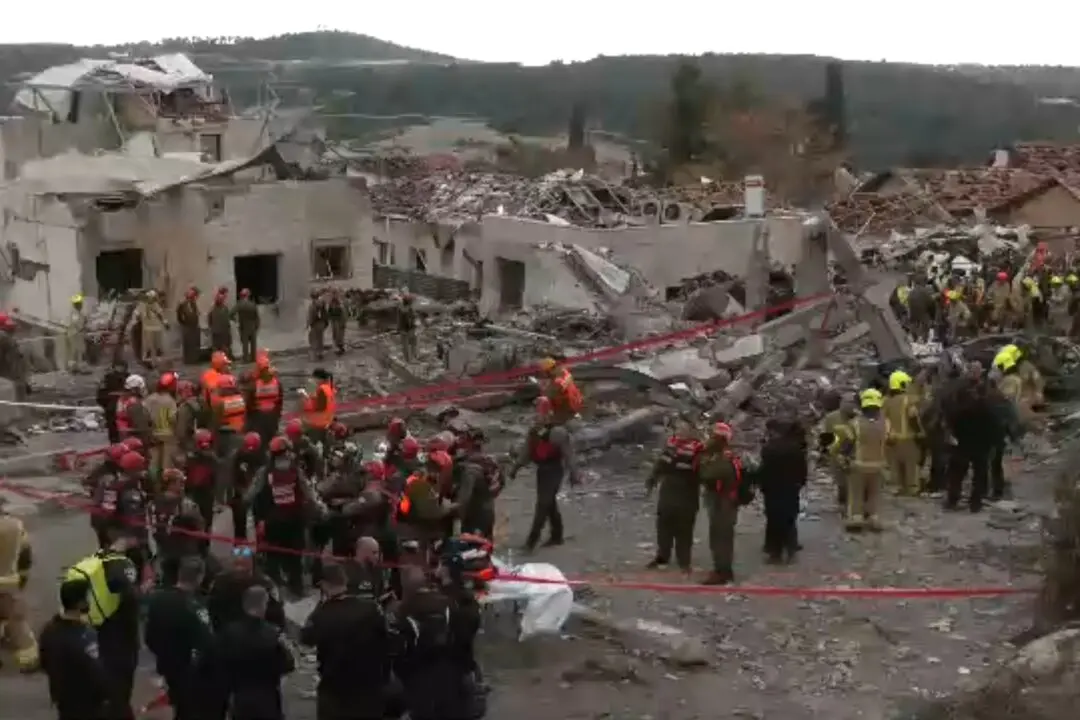 Israeli Security, Rescue Teams at Site Where a Home Was Hit During an Iranian Rocket Attack