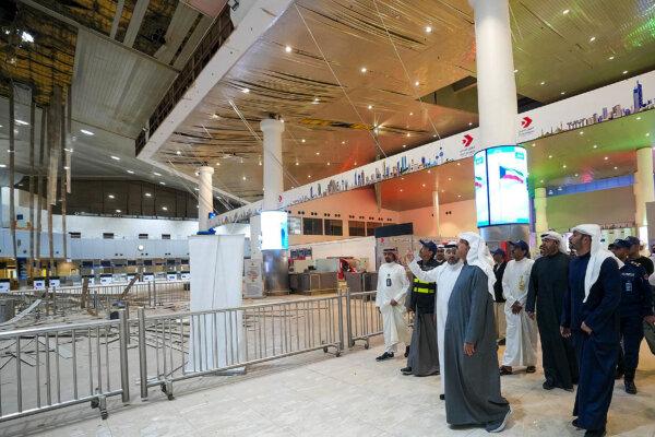 Kuwaiti Prime Minister Sheikh Ahmad al-Abdullah al-Sabah (C) visits the international airport after it was hit by a reported Iranian strike in Kuwait City on March 1, 2026. (KUNA / AFP via Getty Images)