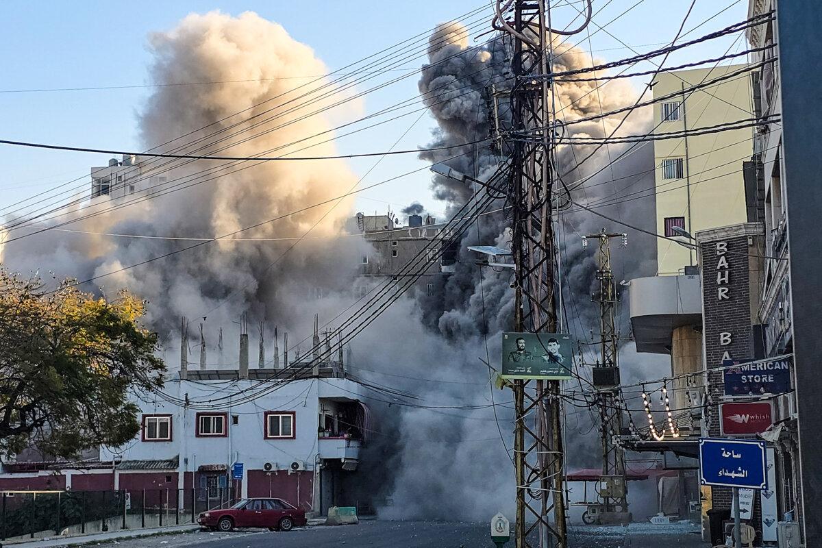 Smoke rises from the site of an Israeli airstrike that targeted the offices of Al-Qard al-Hassan, a Hezbollah-linked financial institution, in the southern coastal Lebanese city of Tyre, on March 2, 2026. (Kawnat Haju / AFP via Getty Images)
