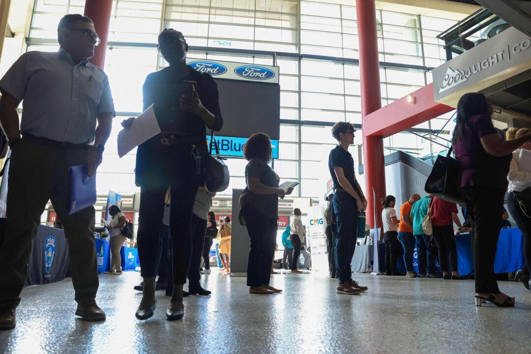 Job seekers attend a job fair in Sunrise, Fla., on Sept. 25, 2025. (Joe Raedle/Getty Images)